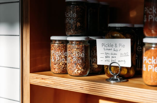 Pickles on display on a shelf at Pickle and Pie.