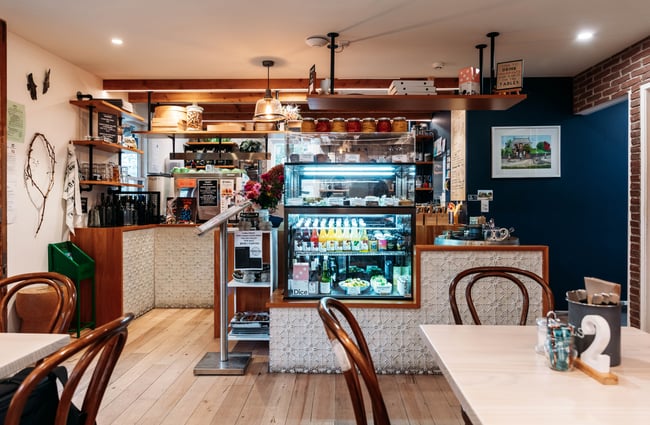 Front counter, cabinet and coffee machine at Pinot Junction.