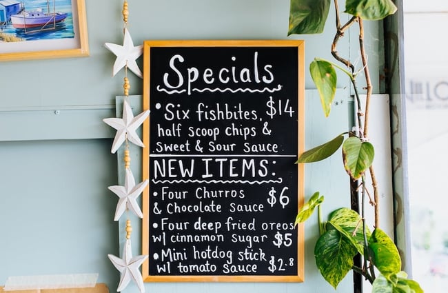 The specials board inside Plimmerton Fish Supply.
