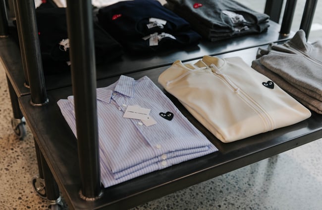 A close up of PLAY shirts by CDG.