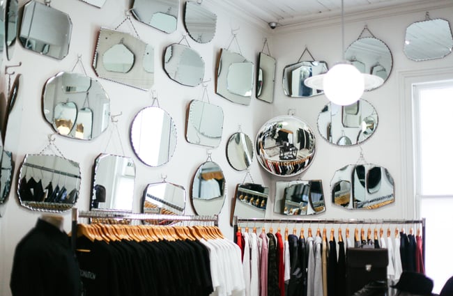Mirrors hanging on walls.