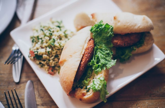 Sandwich on a white plate.