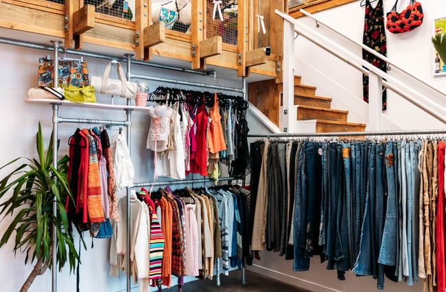 Racks of clothes on display at Preloved Charlies.