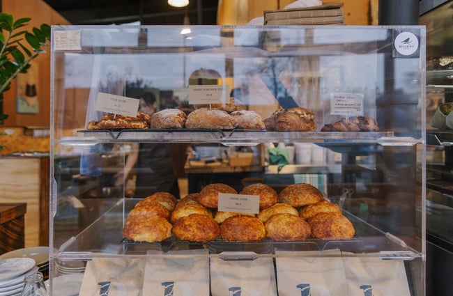 Close up of a cabinet full of scones at Prima Roastery.