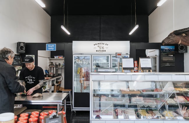 A customer being served in the butchery.