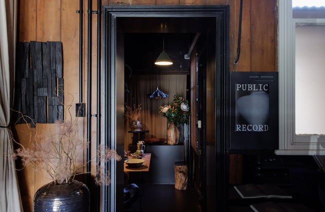 The dark entrance into Public Record Auckland.