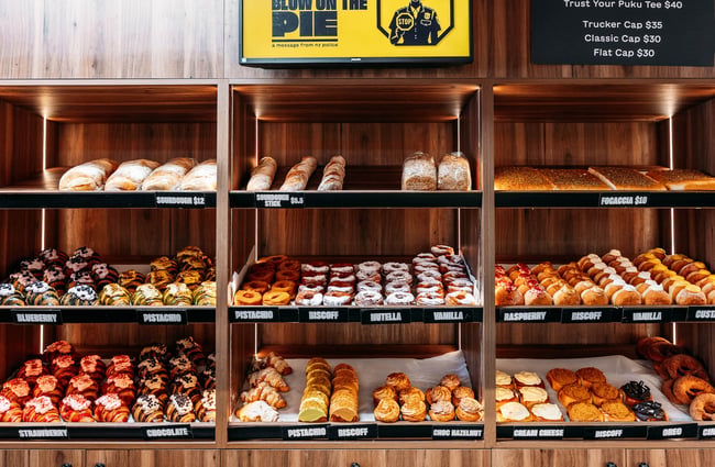 Donuts and Pastries on shelves at Puku Pies in Petone