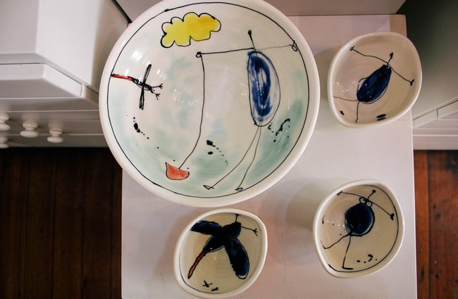 Colourful artwork on plates.
