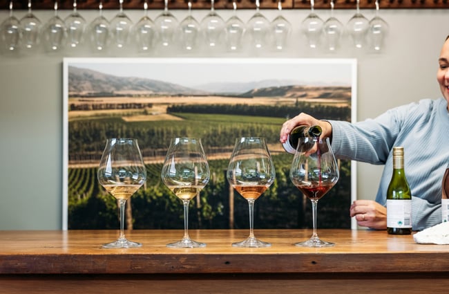 Tasting glasses of wine being poured at Quartz Reef.