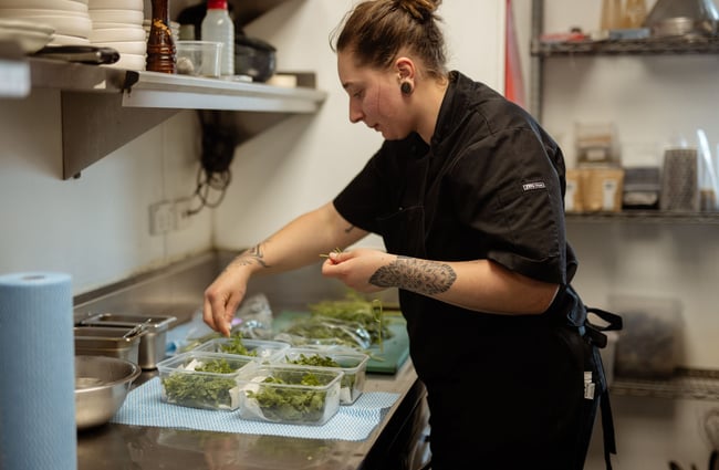 Chef sorting microgreens at Rata restaurant in Queenstown