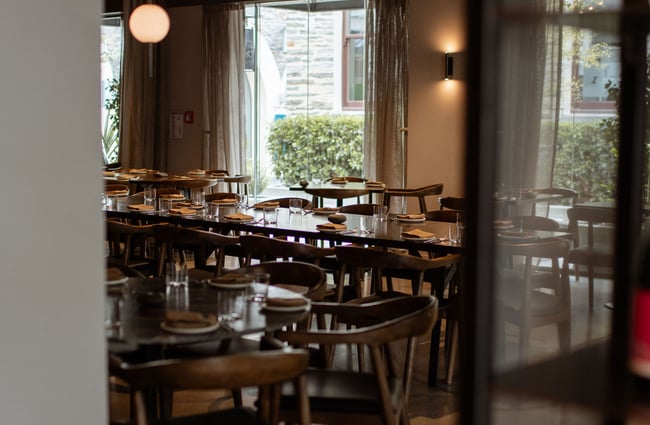 Looking through window into Rata's beautiful dining space