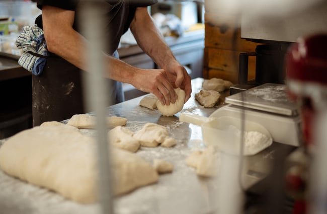 Chef prepping dough at Rata restaurant in Queenstown