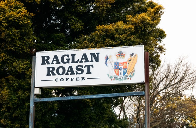 A 'Raglan Roast Coffee' sign.