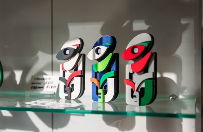 A close up of a colourful statue.