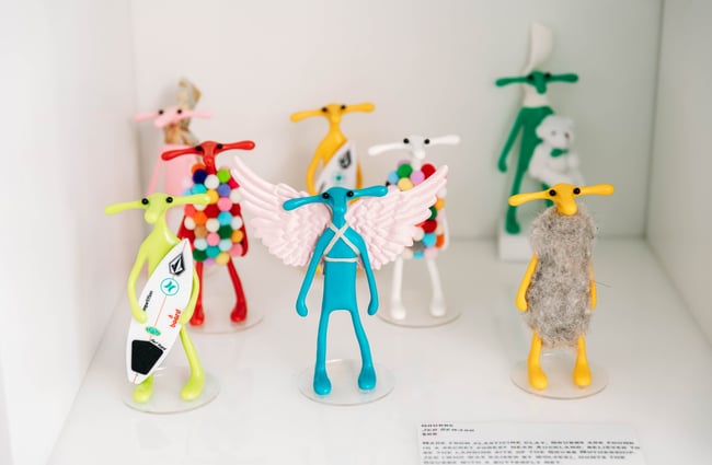 Colourful figurines on display.