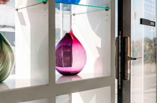 A pink glass vase.