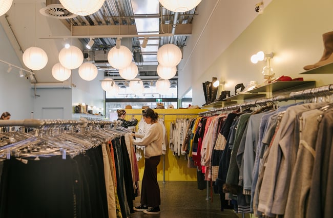 Woman shopping at Recycle Boutique.