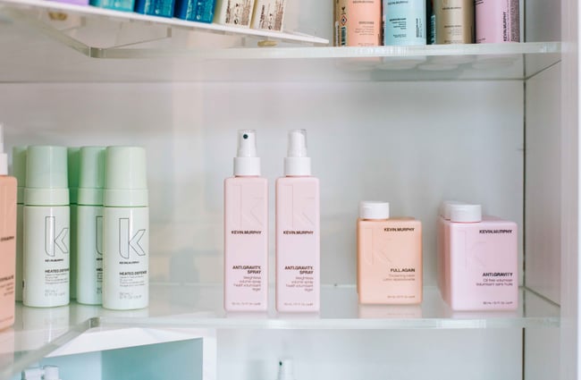 Shelves of product bottles.
