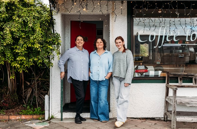 Three woman smiling to camera outside Relish cafe in Rangitikei.
