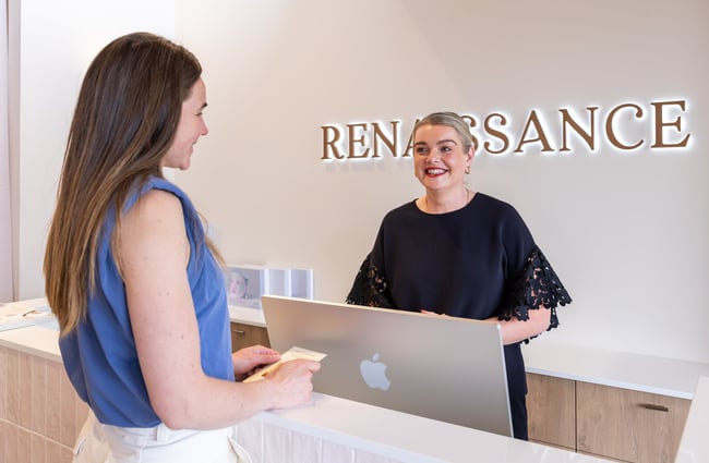 Client being served at the front counter at Renaissance.