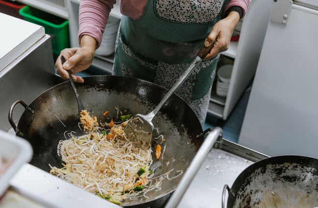 Close of up of noodles being cooked.