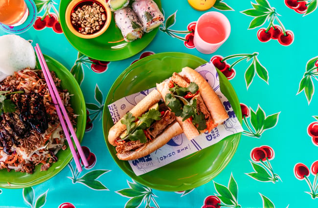 A bahn mi on a table.