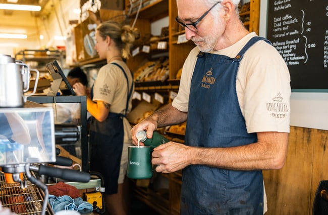 Barista making a coffee at Ringawera Baker.