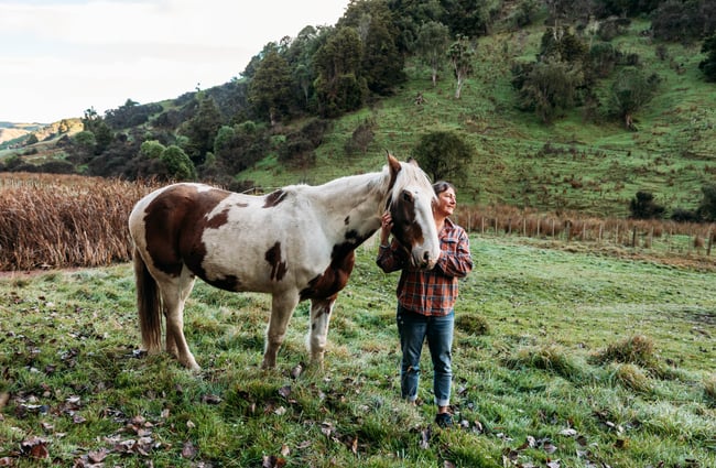 A woman and a horse at River Valley Lodge in Taihape.
