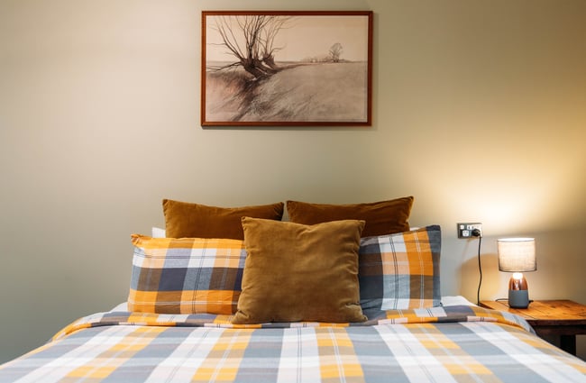 A made up bed at River Valley Lodge in Taihape.