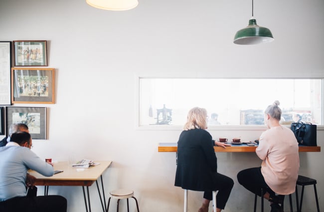 Customers sitting at tables.