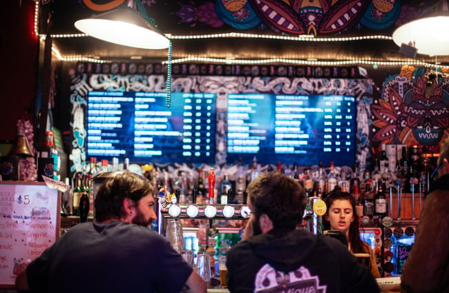 Two men at the bar.