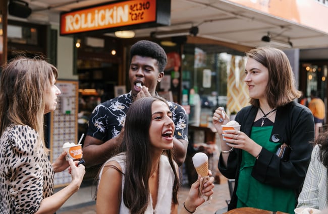Bunch of people eating ice cream.