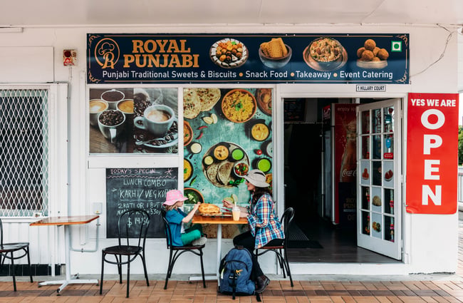 Diners at Royal Punjabi Sweets and Bake House.