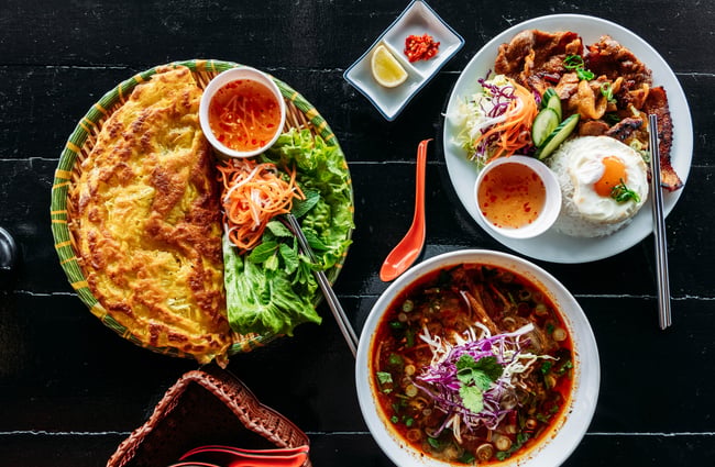 Flatlay of food dishes at Saigon '60s.