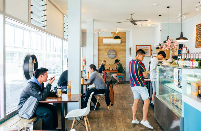 Interior view of Saigon Noon with lots of customers.
