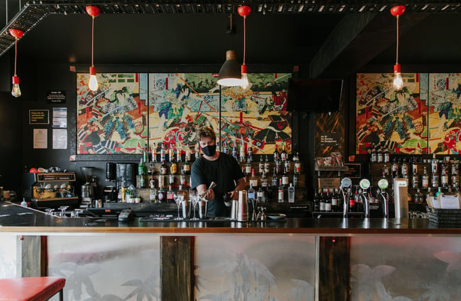 Barman making a cocktail at Saikou, Timaru.