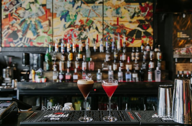 Two cocktails sitting on top of the bar at Saikou, Timaru.