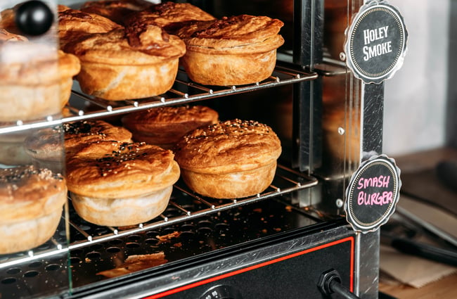 Pies in a pie warmer.