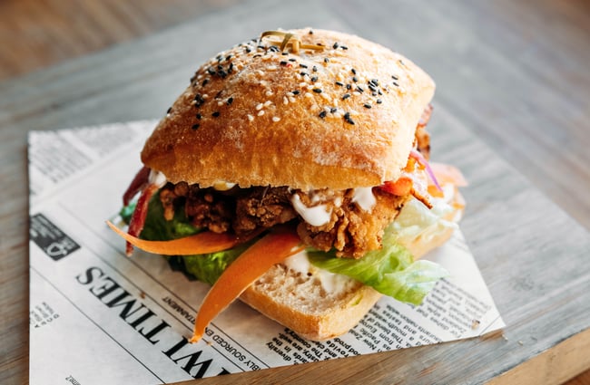 A close up of a filled bun.