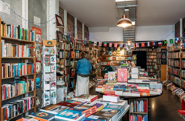 Woman browsing books inside a store