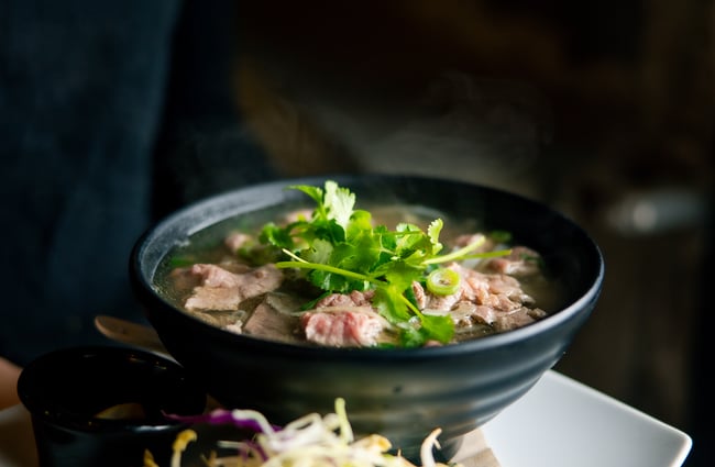 A close up of a beef soup.