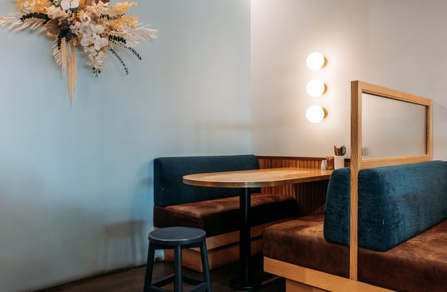 Booth seating area at Sentinel Cafe in Hamilton.