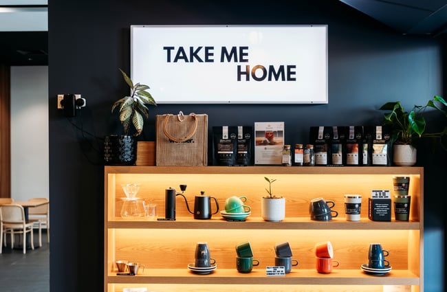 Reusable cups on a display wall at Sentinel Cafe in Hamilton.