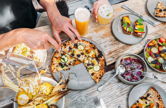 Pizza on a table at The Sherwood Queenstown.