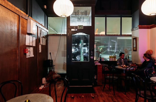 A dimly lit dining room inside Siduri in Gisborne.