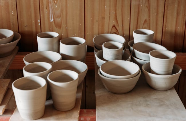 Close up of ceramics on shelf before fired and glazed