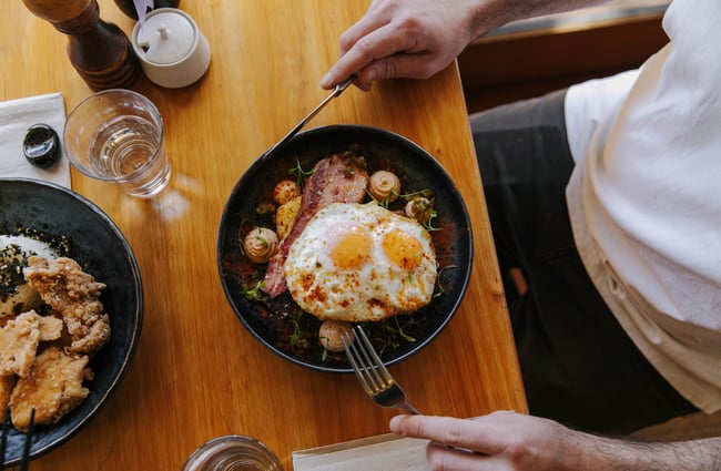 Dish of two fried eggs and bacon hock from Sime's Kitchen.