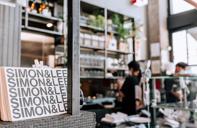 Close up of menus on the counter at Simon and Lee, Auckland.