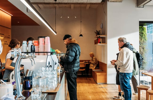 Customers queuing at the counter at Sketchbook Coffee.