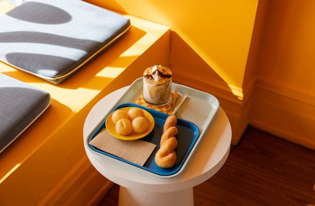 Donuts on a small table.